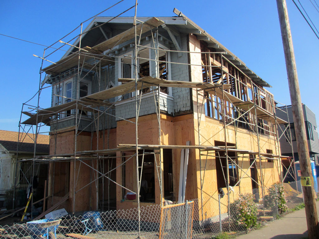During the remodeling process the home is elevated with scaffolding.